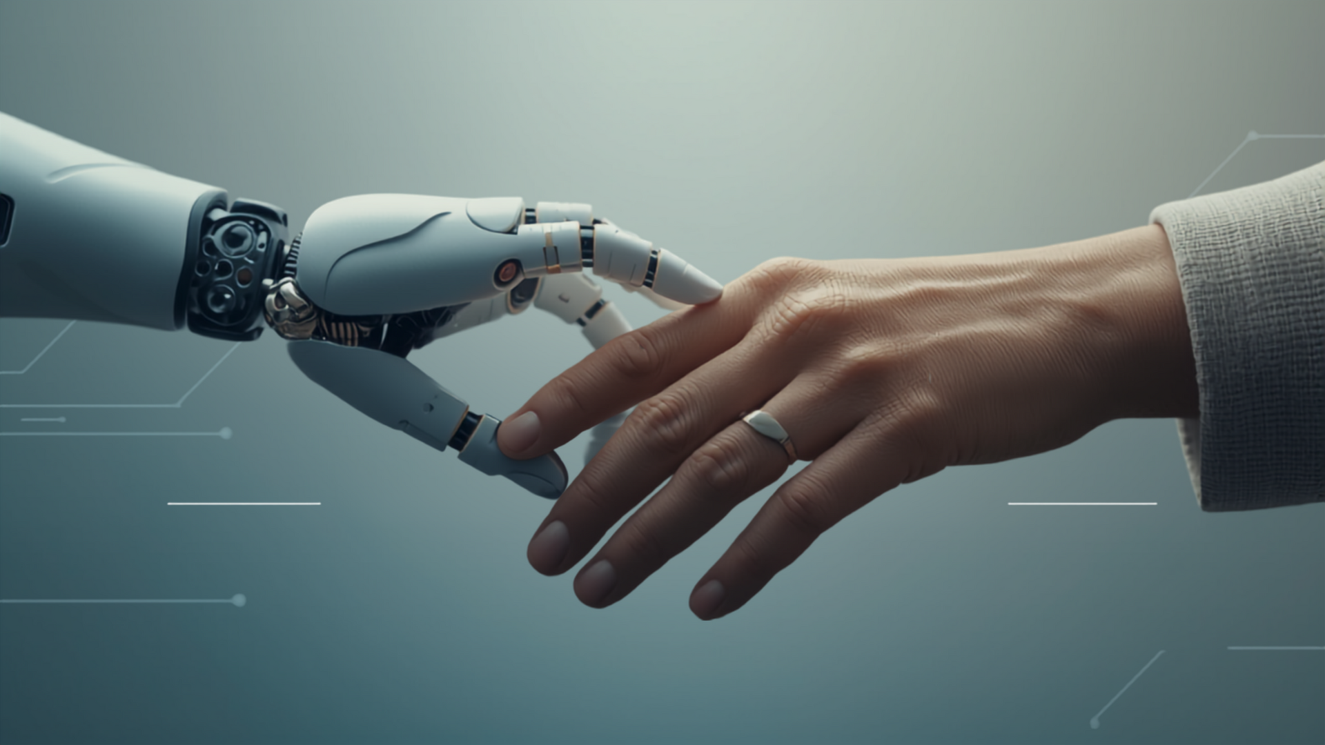 Eine Menschliche Hand und Roboterhand berühren sich